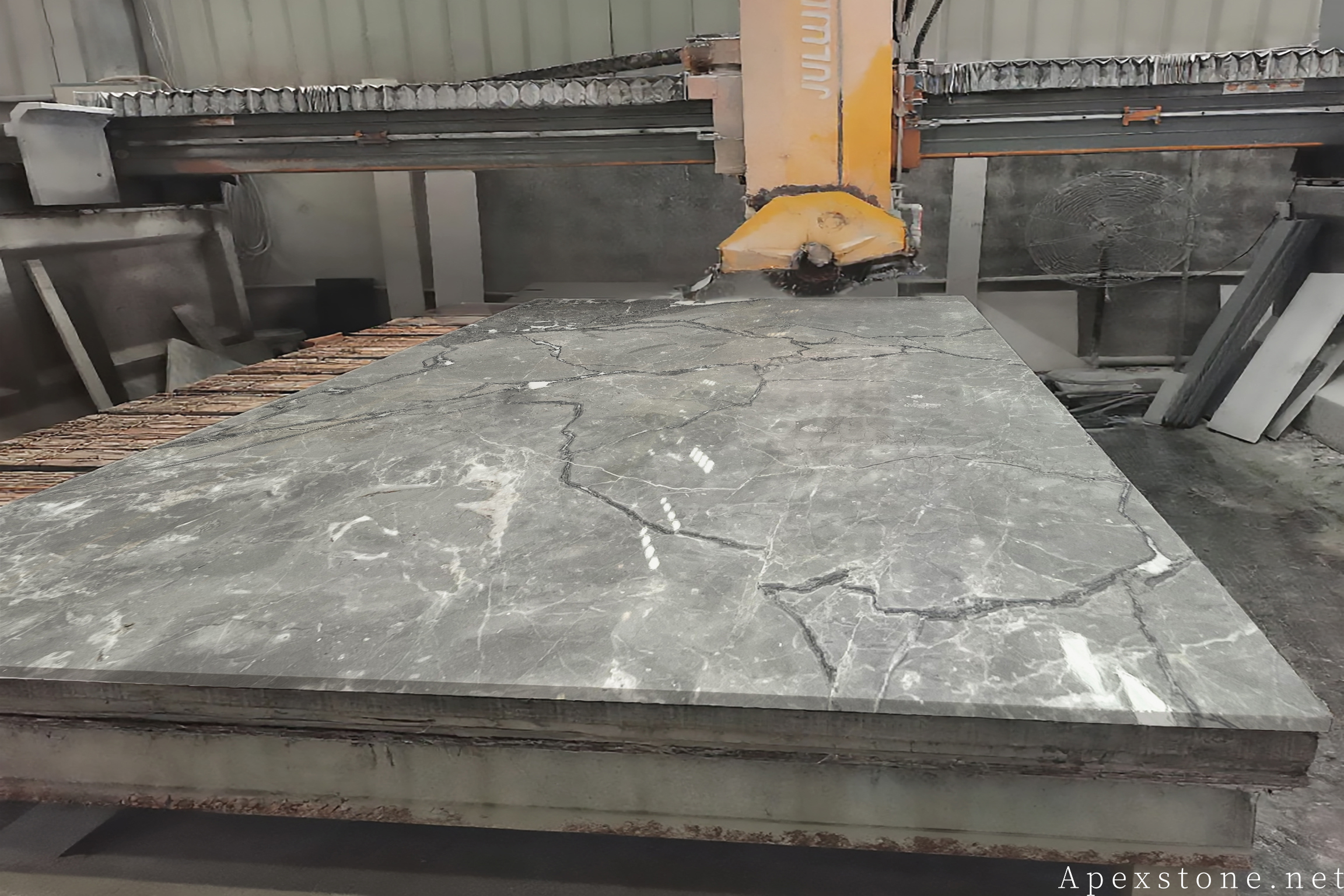 Aqua Grey Marble slab cutting on CNC bridge saw