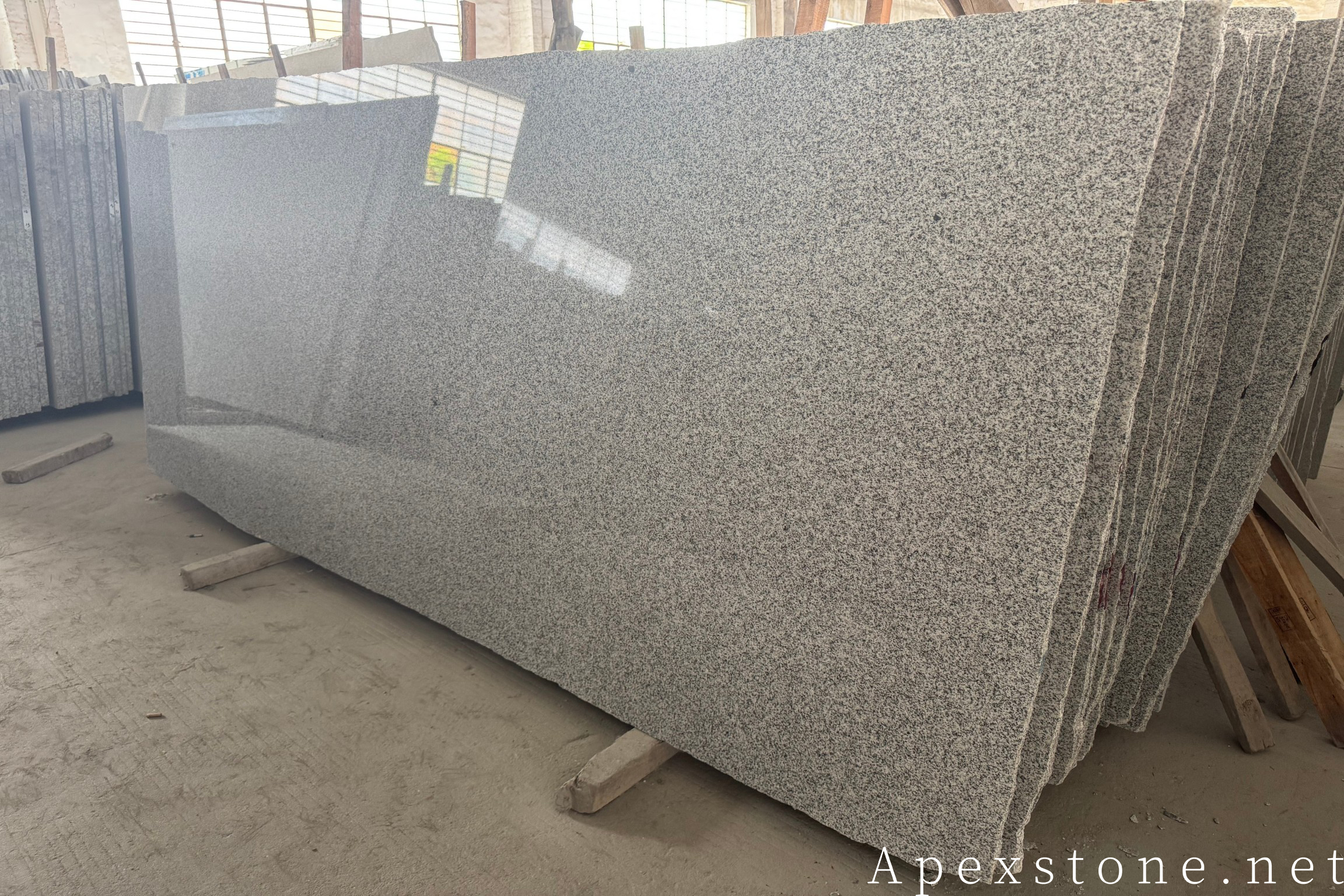 Bianco Crystal granite cut to floor tile slabs