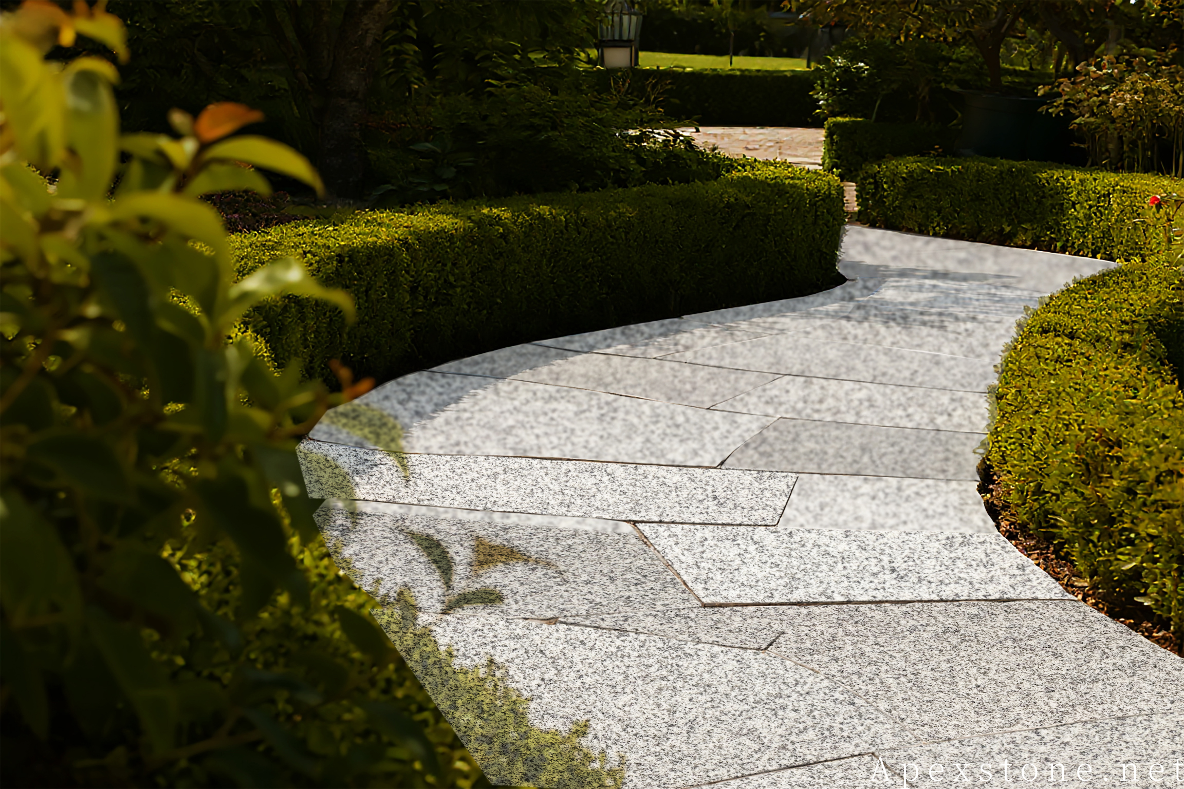 Bianco Crystal granite crazy paving in a cottage garden