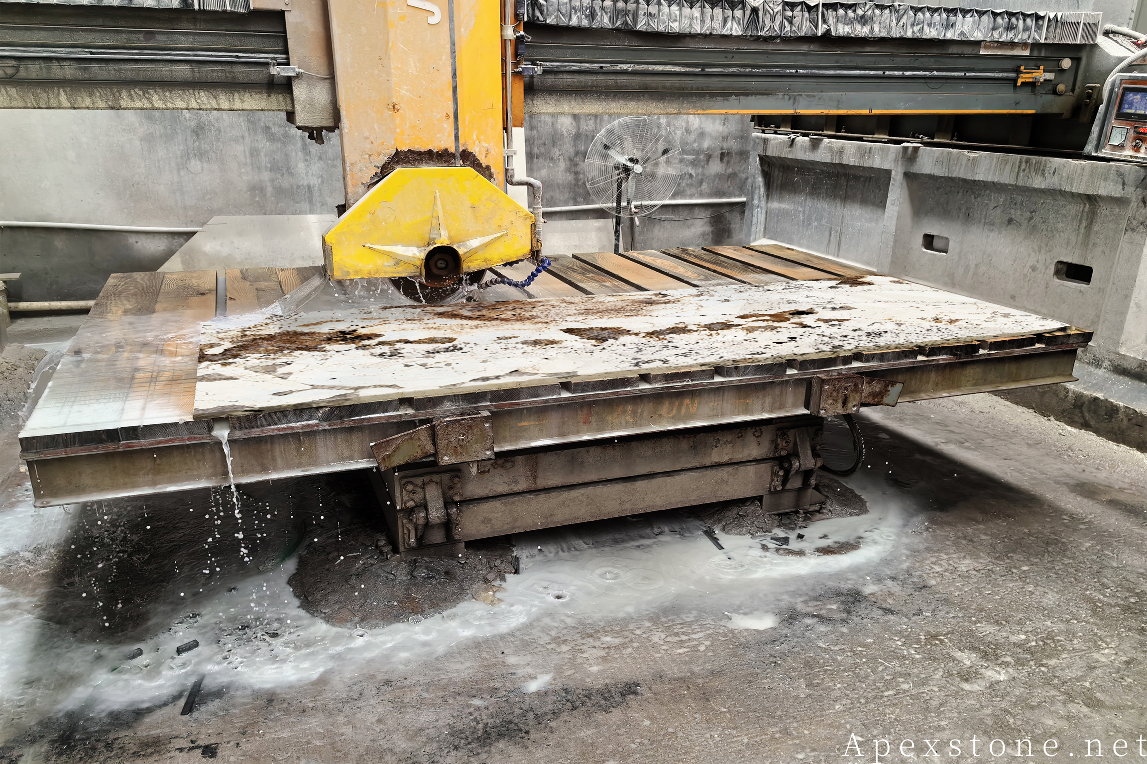 Pandora quartzite countertop slabs being cut on the bridge saw