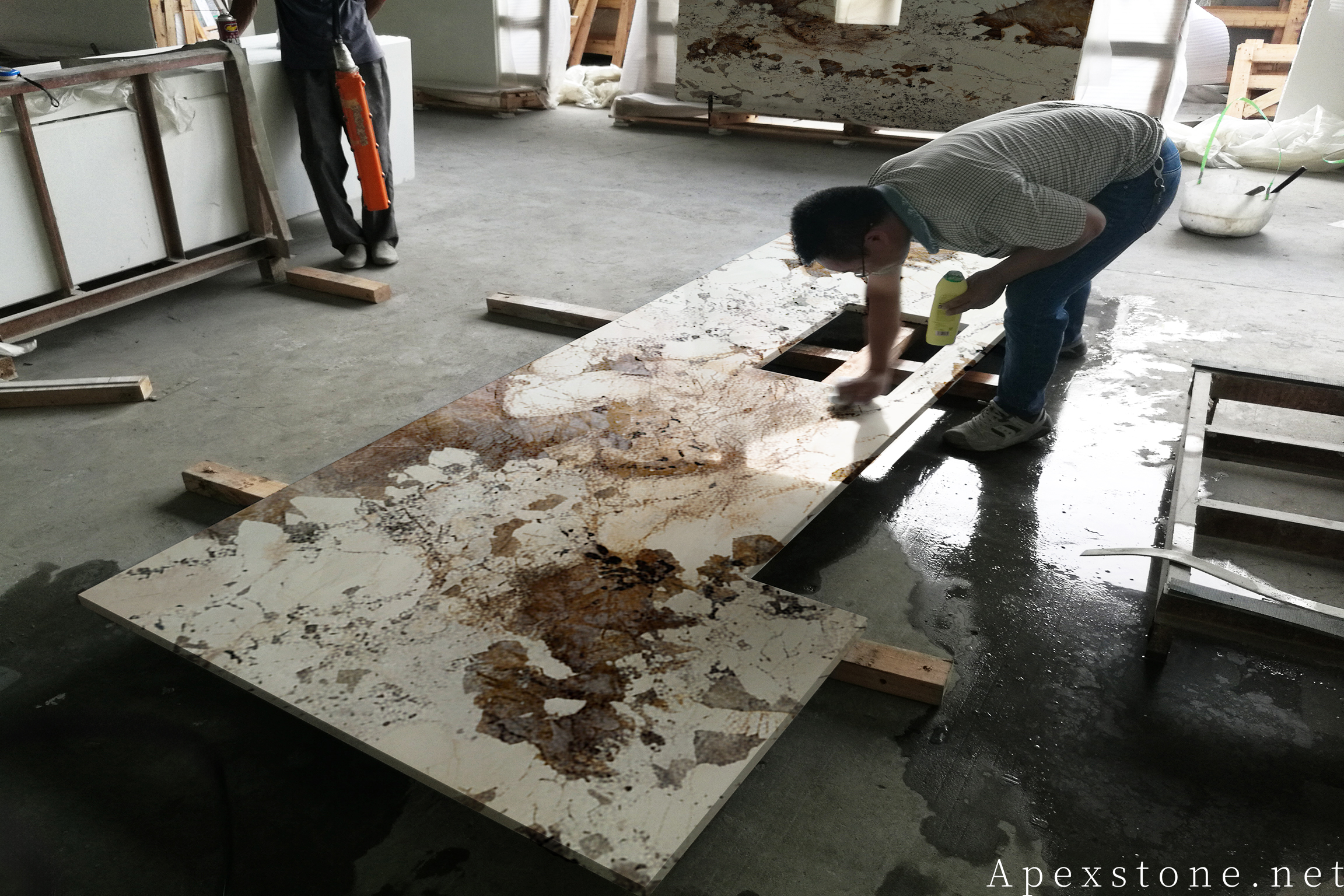 Finished Pandora quartzite countertop pieces inspected against the numbered layout