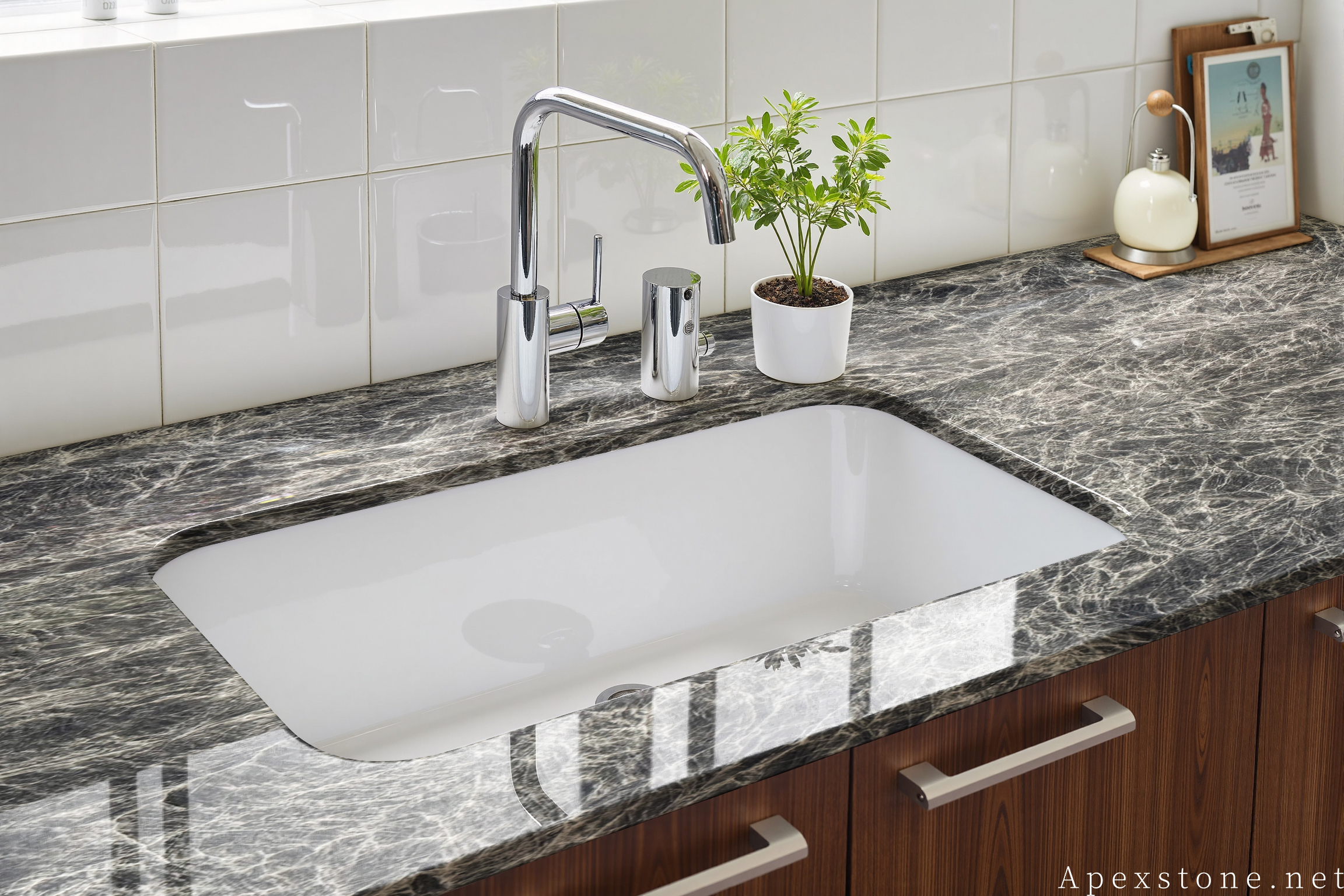 Snow Black Fox marble kitchen with island and perimeter countertops