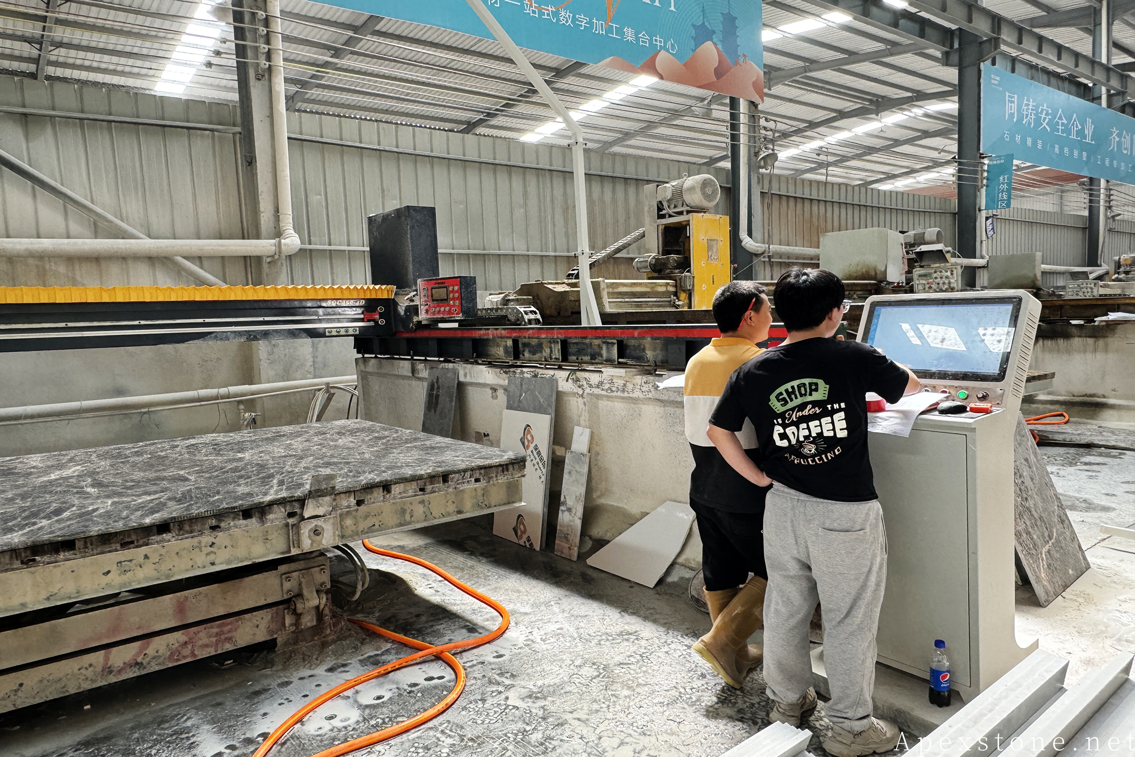 Snow Black Fox marble slab cutting at the factory