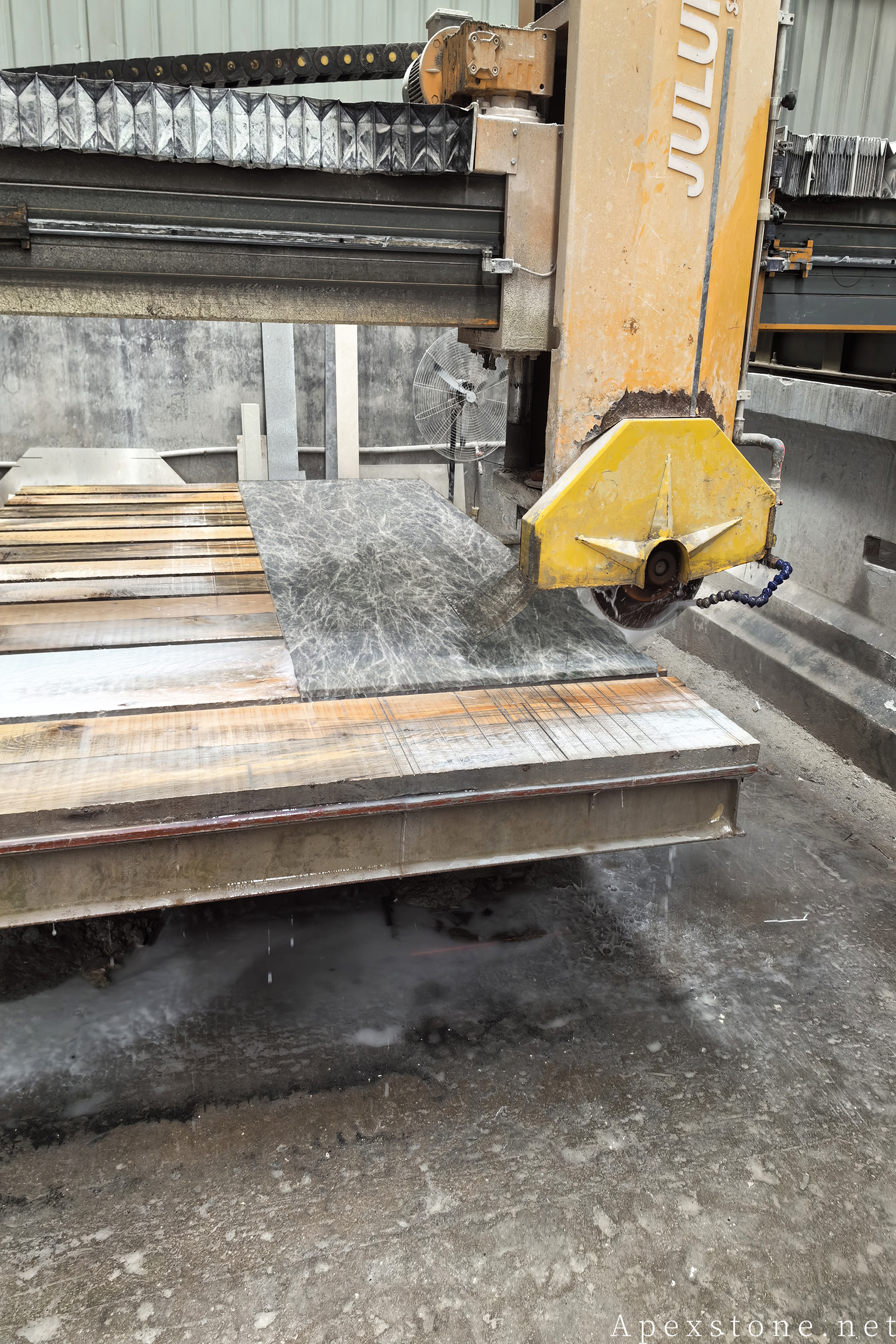 Snow Black Fox marble tile cutting