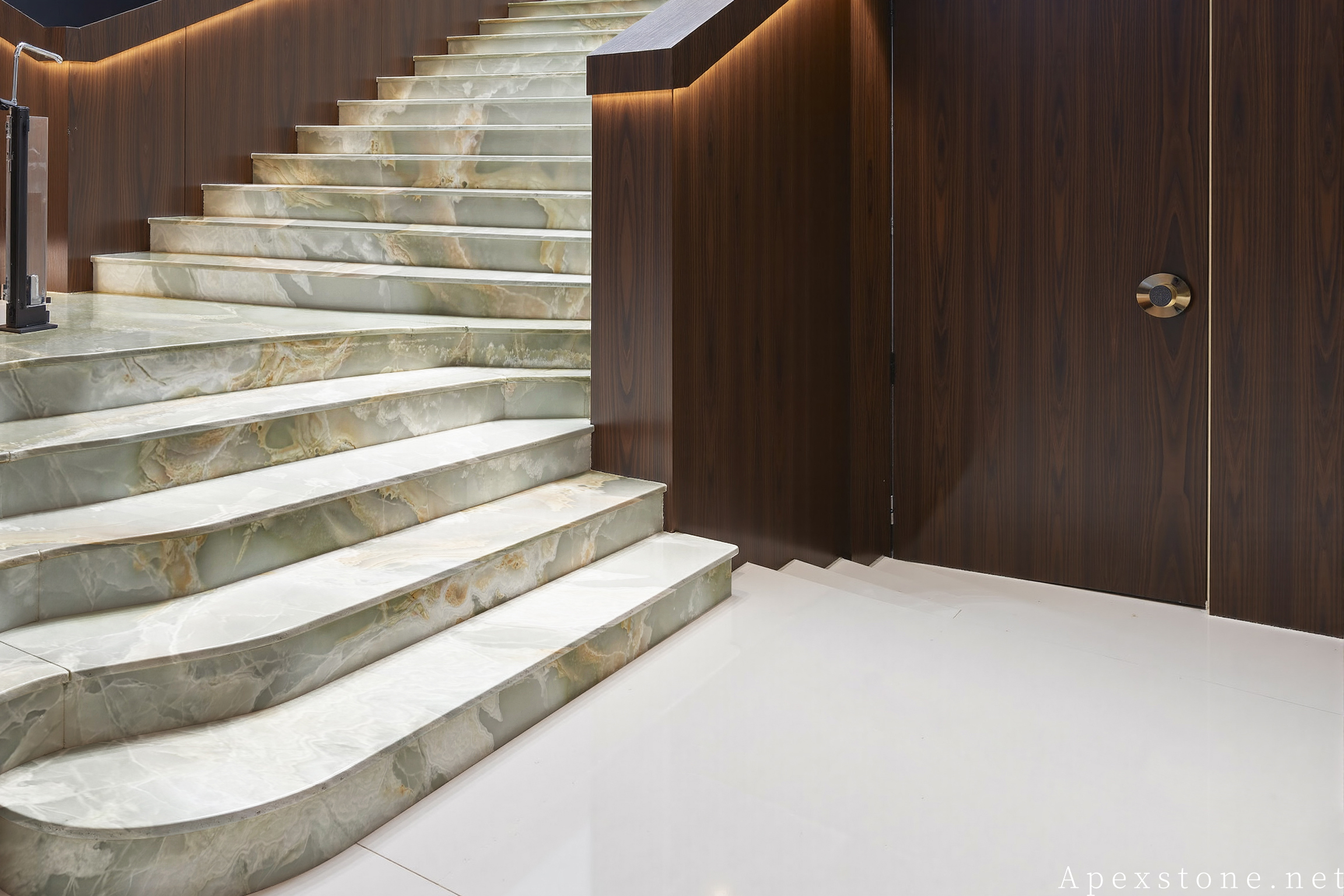 Green Onyx hotel staircase with stone cladding