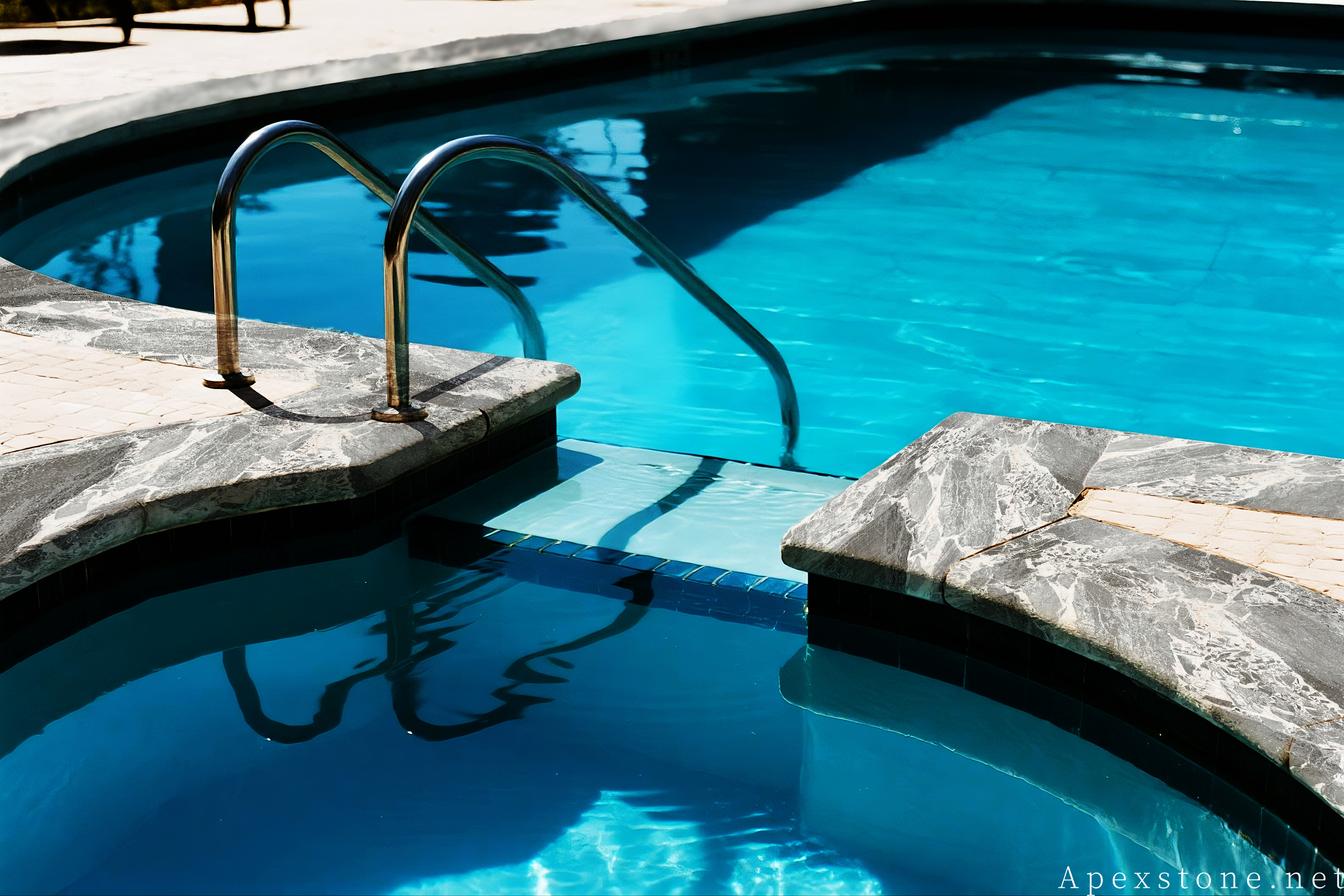Chanel Grey marble pool coping installed around swimming pool
